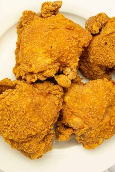 fried chicken on a white plate ready to be eaten