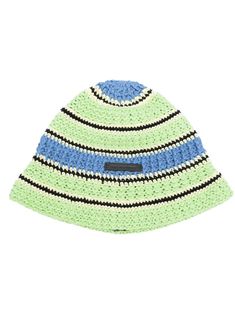 a green and blue knitted hat with black stripes on the front, sitting against a white background