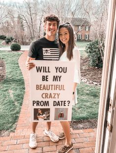 a man and woman holding a sign that says, will you be my beautiful crazy prom date?