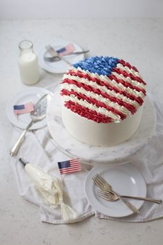 an american flag cake with red, white and blue icing