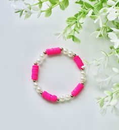 This bracelet is super cute and is inspired by barbie Trendy Pink Beaded Bracelets For Party, Trendy Pink Beaded Charm Bracelet, Pink Adjustable Charm Bracelet For Parties, Adjustable Pink Charm Bracelet For Party, Pink Friendship Bracelet Jewelry, Pink Beaded Bangle Bracelet, Trendy Pink Stretch Bracelet For Party, Playful Pink Jewelry For Party, Playful Pink Party Jewelry