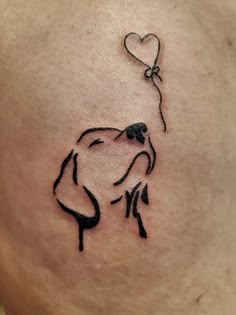 a dog with a heart shaped balloon tattoo on its back side ribcacture