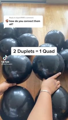 two people are holding black balloons in the middle of a floor with text that reads, how do you connect them?