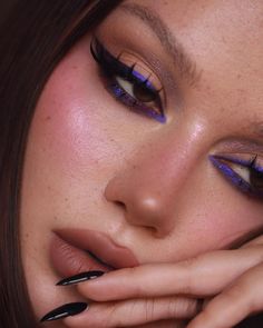 Dark feminine energy, a timeless art mastered by @olgadann featuring the signature Epiphany Glow Melt-On Eyeliner in shade ‘Night of Creation.’ 🎆✨ Graphic Purple Eyeliner, Purple Halloween Eye Makeup, Kaleidos Makeup Looks, Black And Purple Makeup Looks, Purple Liner Makeup, Dark Purple Eyeliner, Purple Blush Makeup, Purple Black Makeup, Dark Purple Eye Makeup