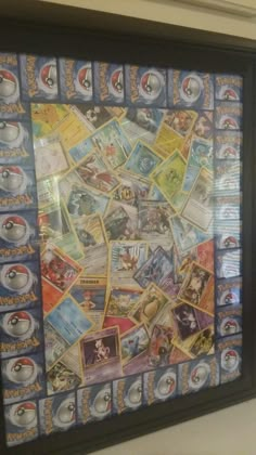 a framed poster with pokemon pictures on it