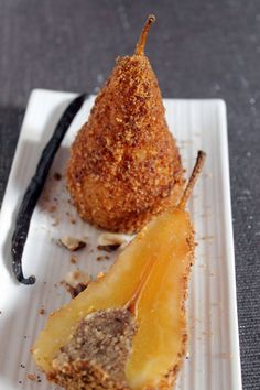 two pieces of fruit on a white plate