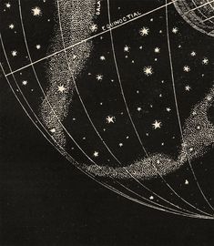 an old black and white drawing of the earth with stars on it's side