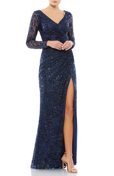 Crafted with sequins and sheer embroidered lace, this floor-skimming long-sleeve gown is defined by a thigh-high slit designed to reveal some skin. Style Name:Mac Duggal Sequin Lace High Slit Long Sleeve Sheath Gown. Style Number: 6261432. Long Sleeve Evening Gowns, Sheath Gown, Mac Duggal Dresses, Long Sleeve Gown, Designer Prom Dresses, Long Sleeve Sequin, Sequin Gown, Mac Duggal, Lace Gown