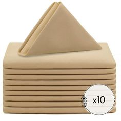 six folded napkins are stacked on top of each other, with one folded in the middle