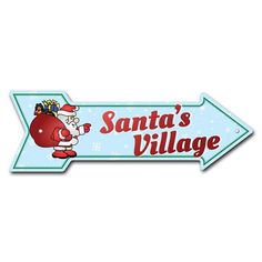 santa's village sign with an arrow pointing to the right