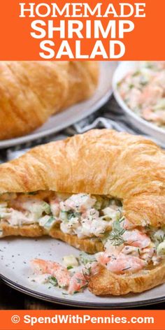 the homemade shrimp salad is cut in half on a plate