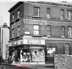 an old black and white photo of a building