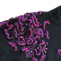 80s 90s Vintage Embroidered and Beaded Embellished Sweater
Made by 

Black pullover sweater with swirled embroidered designs in hot pink, red, green and blue with plastic rhinestone and black beaded embellishments. Made of a ramie and cotton blend. Has large shoulder pads that can be easily removed if desired.

$8 shipping 

Size Women’s Large
28” sleeve (cuff to collar)
23” shoulder 
22” chest flat
25” long

#vintage #sweater #embellished #80s #90s Beaded Embellishments, Embellished Sweater, Black Pullover Sweater, Embroidered Designs, Black Pullover, Sleeve Cuff, Vintage Sweater, Sweater Making, Embroidered Design