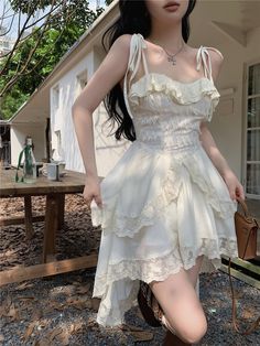 Frilly High Low Fairycore Mini Dress with accented waist and lace trim. (Jacket is NOT included) Fairy Core Outfits, Fairycore Dress, Frilly Dresses, White Sleeveless Dress, White Dresses For Women, Sling Dress, Suspender Dress, Mid Length Skirts, Fairy Dress