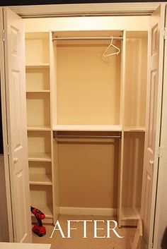 an empty closet with the door open and shoes on the floor in front of it