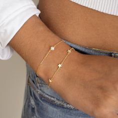 "Such a cute star bracelet, featuring 6 star charms. This bracelet is great for stacking or on its own! Also makes for a special gift!  - - - D E T A I L S - - -  * THICK plating of 14k Gold or Rhodium over 925 Sterling Silver * Available in 6.25\" or 6.75\" + .5\" Ext Chain * Lobster clasp closure * Nickel-free & Hypoallergenic  PEARL BRACELET ON MODEL: https://www.etsy.com/listing/1553833249/pearl-bracelet-dainty-bracelet-delicate Made with 100% Pure Love! ♡ Comes in a gift-box, ready for gift-giving! 🎁 Happy to answer any questions you may have! 🥰 Let's Connect! 🥰 IG: samijewels_" Dainty Adjustable Chain Bracelet With Star Charm, Dainty Star-shaped Bracelets For Everyday Wear, Adjustable Star Charm Chain Bracelet, Dainty Adjustable Star-shaped Bracelet, Dainty Star-shaped Adjustable Bracelets, Dainty Star-shaped Adjustable Bracelet, Jewelry Closet, Bracelet Star, Wedding Bands For Him