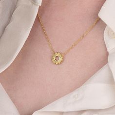 This Beaded Halo Necklace is the perfect finishing touch for any outfit. With its simple halo pendant and beaded texture, it’s both stylish and easy to wear. Crafted in sterling silver or 18ct gold plated sterling silver, this necklace adds a bit of elegance without feeling too fussy. Whether you're layering it with other pieces or wearing it solo, it’s an effortless way to elevate your look. Complete the set with the matching Beaded Halo Ear Studs. Supplied in our Nellou Pouch and Jewellery Box We want your jewellery to stay in great condition so you can enjoy it for years to come. With some simple steps you can help prolong the life of your pieces. Remove your jewellery daily, put it on as the last step when getting ready and the first thing you take off at the end of the day. Avoid spra Halo Necklace, Halo Pendant, Clover Necklace, Gemstone Beaded Bracelets, Birthstone Earring, Gold Plated Bracelets, Pearl Pendant Necklace, Silver Pieces, Gold Plated Necklace