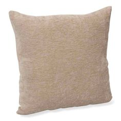 a beige pillow on a white background