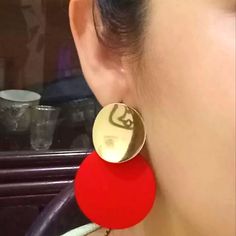 Pretty Gold & Red Disc Earrings Trendy Red Metal Earrings, Bold Red Drop Earrings, Trendy Red Circular Jewelry, Modern Red Round Earrings, Trendy Red Party Earrings, Modern Red Earrings For Party, Modern Red Party Earrings, Chic Red Earrings, Disc Earrings