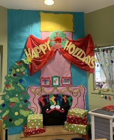 a room decorated for christmas with presents and decorations