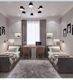 a bedroom with two beds, desks and pictures on the wall above them in black and white