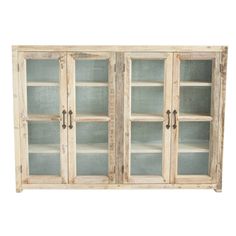 an old wooden cabinet with glass doors