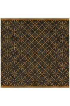 a brown and black area rug with an intricate design on the front, along with a gold border