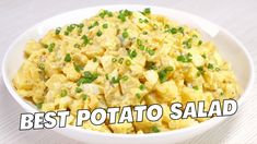 a white bowl filled with potato salad on top of a wooden table and the words best potato salad