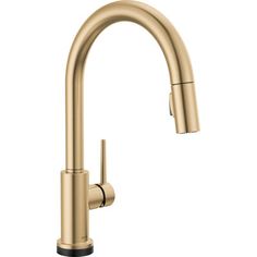 the kitchen faucet is shown in gold with black handles and an angled spout