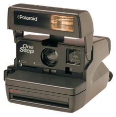 the polaroid one step camera is on display