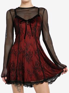 This twofer dress is giving vampire romance. This gothic piece features a red slip dress with a black floral lace overlay and bow detailing at the chest. Comes with a fishnet long-sleeve underneath and adjustable straps. Twofer Dress, Vampire Dress, Vampire Clothes, Velvet Slip Dress, Red Slip Dress, Goth Dress, Romantic Lace, Gothic Dress, Gothic Outfits