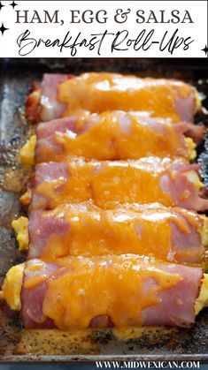 ham, egg and salsa breakfast roll ups on a baking sheet with text overlay