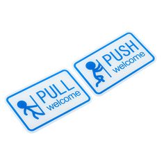 two blue and white stickers that say push welcome to the person on the sign