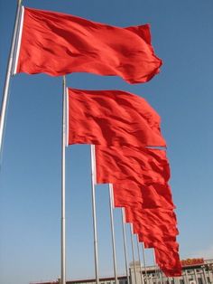 several red flags are flying in the wind