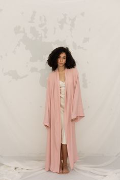 Introducing our Pink Silk Abaya, a luxurious and captivating piece that combines traditional Arab fashion with a modern touch. This exquisite garment is designed to make a statement, featuring elegant decorations on the sleeves and bottom. This LONG ABAYA is perfect for those seeking an elegant look. ◼ Crafted with the utmost care, our Pink Silk Abaya showcases a stunning design that exudes grace and sophistication. The flowing silhouette gracefully drapes over your body, flattering every figure Elegant Long Kaftan For Daywear, Elegant Maxi Length Kimono For Daywear, Elegant Oversized Abaya, Long Abaya For Spring Wedding, Elegant Long Oversized Abaya, Elegant Oversized Long Abaya, Spring Wedding Abaya In Long Shape, Elegant Pink Long Sleeve Kimono, Elegant Long Pink Thobe