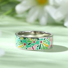 Add a serious dose of radiance to your outfit with splash of color! Bright and whimsical, the silver enamel band ring makes a statement with any outfit. Combine this trendy piece with other enamel pieces to vibrant and radiant effect. Enjoy the benefits of it, such as brining good luck and love, enhancing health and beauty.Weight: 5.84 gWidth: 7.2 mmHeight: 1.7 mmThickness: 1.6 mmMaterial: 925 SilverPlating Color: Silver Bohemian Green Rings For Summer, Enamel Jewelry For Spring Gifts, Spring Enamel Jewelry For Gifts, Spring Enamel Jewelry As Gift, Hand Painted Jewelry For Spring, Hand Painted Jewelry As Spring Gift, Hand Painted Jewelry For Spring Gift, Spring Hand Painted Jewelry, Spring Gift Enamel Jewelry