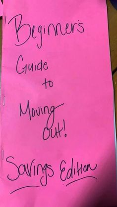 a pink sign with writing on it that says, beginners guide to moving out