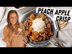 a woman standing in front of a plate of food with the words peach apple crisp on it