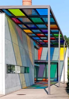 a building with multicolored glass covering it