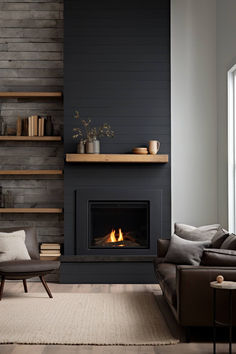 a living room filled with furniture and a fire place in the middle of the room