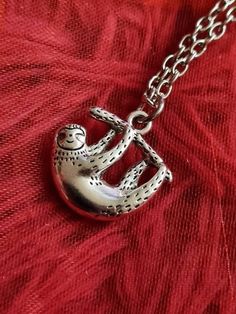 "Super cute little sloth pendant 🖤 The pendant is solid antique silver and measures 20mm (2cm) 🖤 This cute lil guy is hanging on a silver plated 20\" chain 🖤 I can make the chain longer or shorter if required, just pop the length you want in the note to seller on your order 🖤" Cute Silver Jewelry With Adjustable Chain, Fun Nickel-free Metal Jewelry, Fun Silver Metal Jewelry, Casual Silver Jewelry As Gift, Casual Silver Jewelry For Gifts, Adjustable Silver Novelty Jewelry, Novelty Handmade Metal Jewelry, Personalized Silver Casual Jewelry, Personalized Casual Silver Jewelry