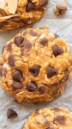 two cookies with chocolate chips and peanut butter on top