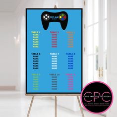 a video game controller table plan on a easel in front of a white wall