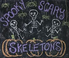 a chalkboard with skeletons and words written on it that say skeleton scary skeletons