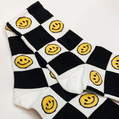 Combined cotton, spandex, polyester, polyurethane calf socks. Checkered pattern with alternating yellow smiley faces. One size fits women 7- 11 Trendy Yellow Socks, Trendy Yellow Winter Socks, Fun Yellow Cotton Socks, Smiley Face Clothing, Bath Salt Gift Set, Checkered Socks, Happy Smiley Face, Yellow Smiley Face, Funky Socks