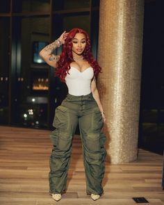 Cargo With Heels Outfit, Birthday Outfit Cargo Pants, Cute Army Pants Outfit, Cargo Jumpsuit Outfit Black Women, Green Cargo Pants Outfit Black Women, Cargo Pants Club Outfit, Cargo With Heels, Cargo Pants Outfits Black Women, Cargo Pants Corset Outfit