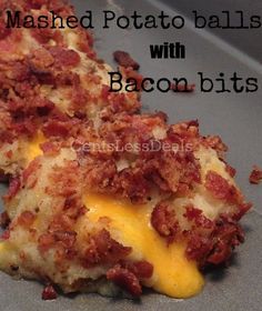 bacon bits are on top of the cheese and sauce covered baked potato casserole