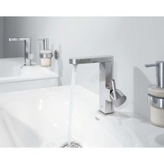 two faucets are shown in the bathroom sink