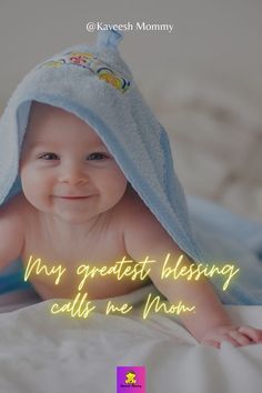 a baby with a blue towel on his head and the words, my greatest blessing calls me mom