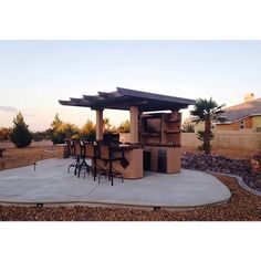 Outdoor Kitchen T.V. Media Wall with Pergola and Outdoor Bar Outdoor Bar Seating, Built In Bbq Grill, Bbq Grill Island, Arizona Backyard, Brick Projects, Outdoor Barbeque, Grill Island, Tv In Kitchen, Dream Patio